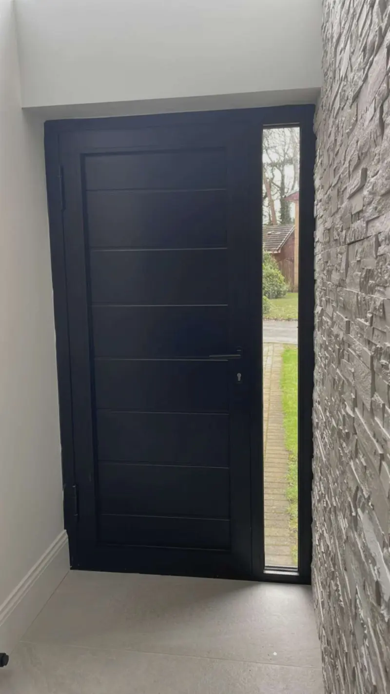 Entrance door in a stone surround