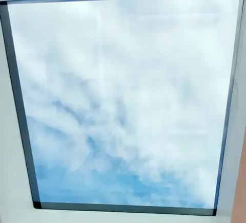 Flat rooflight looking to sky