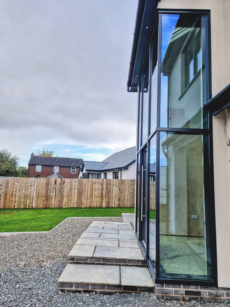 Sliding doors onto a gravel terrace